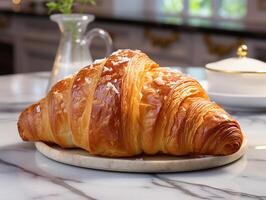 fotografie van Frans croissant Aan de wit marmeren tafel ai gegenereerd foto