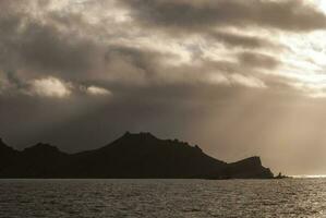 zonsondergang over- antarctica zee foto