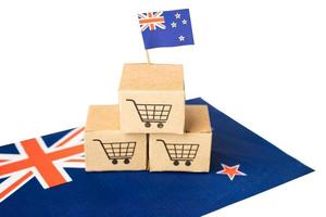 winkelwagentje-logo met de vlag van Nieuw-Zeeland, online winkelen import export e-commerce financiën bedrijfsconcept.