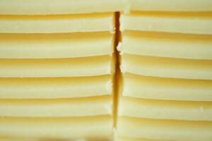 snijden kaas in stukken detailopname, foto