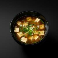 voedsel fotografie van miso soep Aan zwart kom geïsoleerd Aan donker achtergrond. generatief ai foto