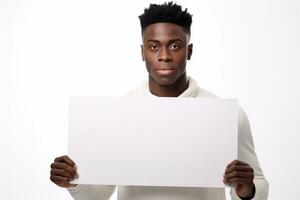 gelukkig jong zwart Mens Holding blanco wit banier teken, geïsoleerd studio portret. ai gegenereerd foto