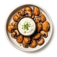 gebakken champignons met knoflook aioli geïsoleerd Aan wit achtergrond top visie foto