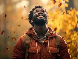 Afrikaanse Mens in emotioneel dynamisch houding Aan herfst achtergrond ai generatief foto