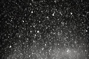 ai generatief wit sneeuw Aan een zwart metaal oppervlakte abstract winter grunge achtergrond foto