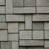grijs stenen van variërend maten beton blokken gebouwd in een muur, kan worden gebruikt net zo achtergrond foto