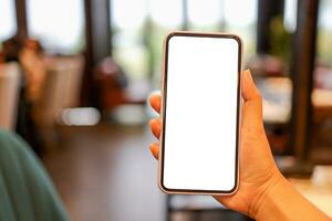 vrouwen handen Holding cel telefoon blanco kopiëren ruimte scherm. smartphone met blanco wit scherm geïsoleerd Aan wit achtergrond . slim telefoon met technologie concept foto