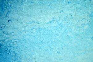 blauw abstract achtergrond met water druppels foto