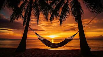 rustig tropisch strand met palm bomen en hangmat silhouet Bij zonsondergang vertegenwoordigen zorgeloos zomer genot en positief energie foto