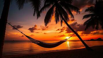 rustig tropisch strand met palm bomen en hangmat silhouet Bij zonsondergang vertegenwoordigen zorgeloos zomer genot en positief energie foto