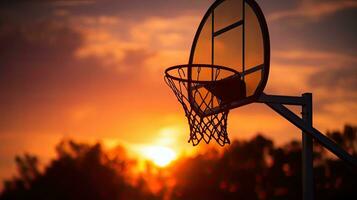 ideaal behang met zonsondergang silhouet in basketbal hoepel foto