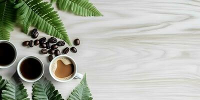 tafel top visie van koffie beker, koffie zaden en verbinding geveerd bladeren. foto