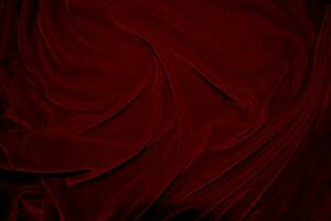 rood fluweel kleding stof structuur gebruikt net zo achtergrond. rood panne kleding stof achtergrond van zacht en glad textiel materiaal. verpletterd fluweel .luxe scharlaken voor zijde. foto