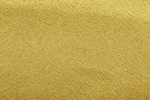 gouden papier folie Aan achtergrond textuur. foto