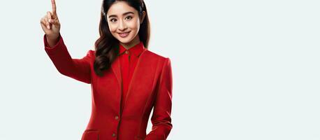 mooi Aziatisch vrouw vervelend rood kleding presenteren iets geïsoleerd Aan wit achtergrond foto