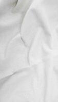 kleding stof backdrop wit linnen canvas verfrommeld natuurlijk katoen kleding stof natuurlijk handgemaakt linnen top visie achtergrond biologisch eco textiel wit kleding stof linnen structuur foto