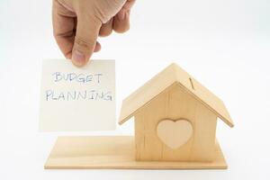 begroting planning voor buying een huis. concept van besparing geld naar kopen een appartement, huis of andere woon- eigendom. echt landgoed concept. foto