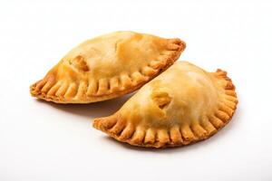 een paar van empanadas zittend Aan top van een wit achtergrond ai generatief foto