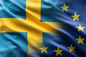 vlaggen van Zweden en EU blazen in de wind foto