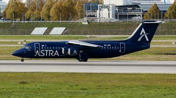 astra luchtvaartmaatschappijen Brits ruimtevaart bae-146 sx-diz passagier vlak vertrek Bij München luchthaven foto