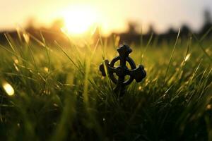 conceptuele zwart kruis religie symbool silhouet in gras over- zonsondergang of zonsopkomst lucht gegenereerd foto