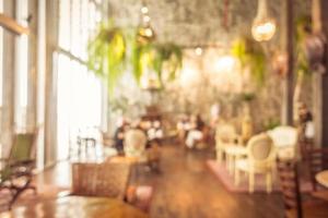 abstracte vervaging en onscherpe restaurant en coffeeshop café interieur foto