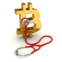 bitcoin symbool en rood stethoscoop foto