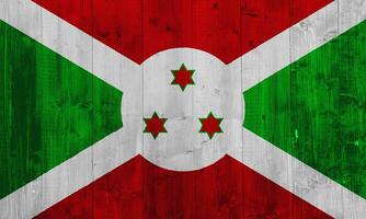 vlag van republiek van Burundi Aan een getextureerde achtergrond. concept collage. foto