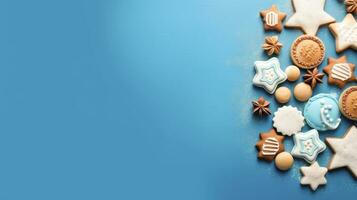 Chanoeka koekjes en snoepjes Aan blauw achtergrond Joods vakantie thema kleurrijk ster het beste voor achtergrond in de ontwerp ai generatief foto