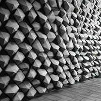 futuristische mozaïek- muur met gestapeld 3d bakstenen foto