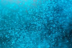 blauwe bokeh splash achtergrond foto