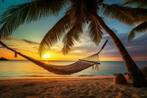 sereen tropisch strand tafereel Bij zonsondergang met palm bomen, een hangmat, en zacht zand ai generatief foto
