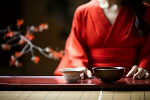 dichtbij omhoog visie van een Japans vrouw in een rood kimono zittend seiza-stijl, met keramisch kom voor thee ceremonie. ai gegenereerd. foto