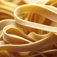 dichtbij omhoog van een rauw droog Italiaans pasta fettuccine. ai generatief foto