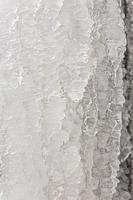 achtergrond van ijs. de structuur van bevroren water. textuur foto