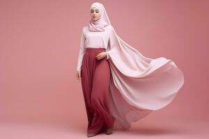 hijab mode. vol lengte van mooi jong Aziatisch moslim vrouw in hijab Aan roze achtergrond ai gegenereerd foto