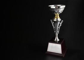 trofee award op zwarte achtergrond foto