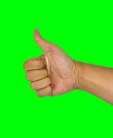 duimen omhoog hand- teken met groen scherm achtergrond, goedkeuring of Leuk vinden deze gebaar vinger foto