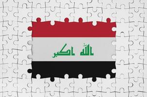 Irak vlag in kader van wit puzzel stukken met missend centraal een deel foto