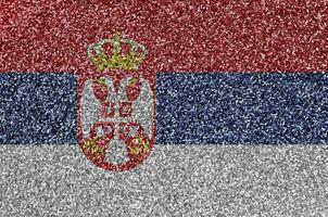 Servië vlag afgebeeld Aan veel klein glimmend pailletten. kleurrijk festival achtergrond voor partij foto