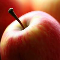 een detailopname van een rood appel met water druppels Aan het generatief ai foto