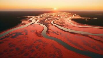 toeristen wandelen Aan woestijn zand duinen met rood rivier- antenne visie Bij zonsondergang, gegenereerd met ai foto