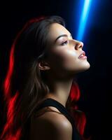 portret van mooi vrouw met rood licht straal in haar haar- Aan zwart achtergrond voorraad foto generatief ai