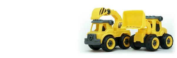 geel plastic vrachtauto en bulldozer speelgoed- geïsoleerd Aan wit achtergrond met kopiëren ruimte voor tekst of banier foto