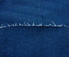 structuur van blauw jeans met draad foto