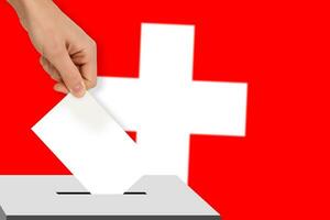 hand- druppels de stemming verkiezing tegen de achtergrond van de Zwitserland vlag, concept van staat verkiezingen, referendum foto
