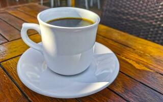 kop van americano zwart koffie in restaurant Mexico. foto