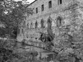 fotografie Aan thema uitstekend gebouw mooi steen oud water molen foto