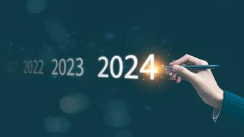 vrolijk Kerstmis en gelukkig nieuw jaar 2024 concept, planning naar begin een nieuw bedrijf en leven ,bedrijf beoordeling ,zakenman nieuw jaar bedrijf doelen 2024 ,marketing strategie planning , gefocust foto