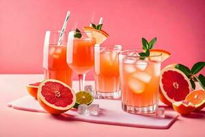 grapefruit cocktail met limoen en munt Aan een roze achtergrond. ai-gegenereerd foto